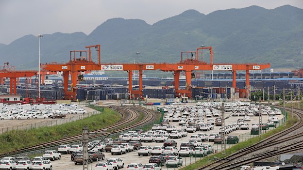 Cars and containers ready to be freighted out of Chongquin. 