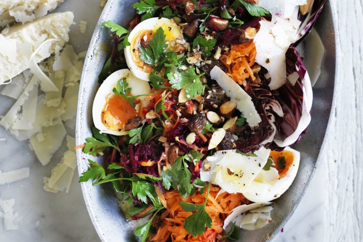 Soft-boiled eggs with beetroot, carrot and parsley salad.