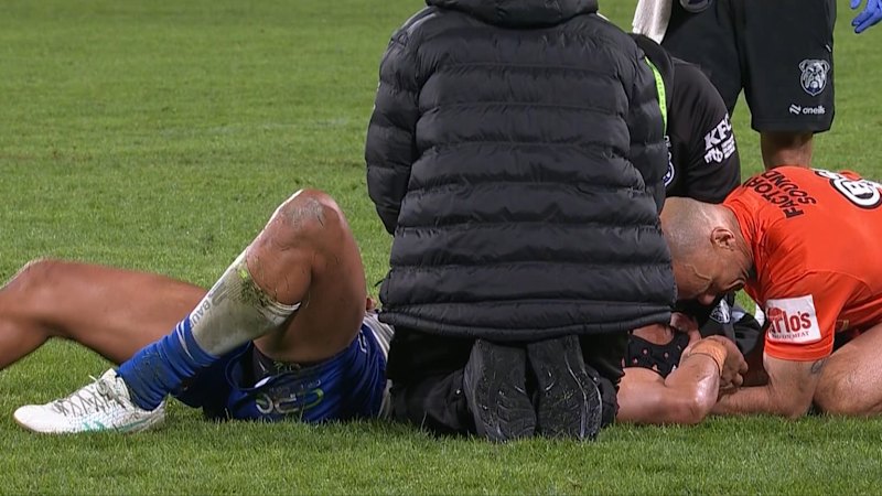 Bulldogs captain stretchered off