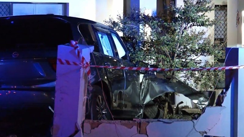 Three children hospitalised after car hits house wall
