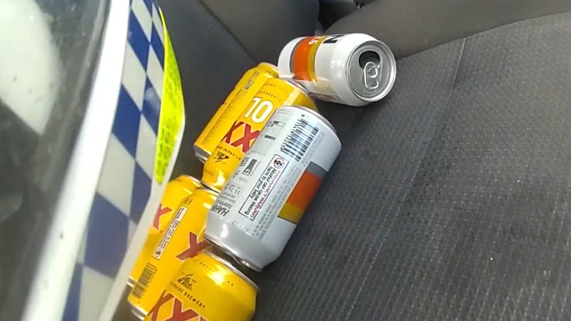 Police find empty beer cans in alleged drunk driver's car