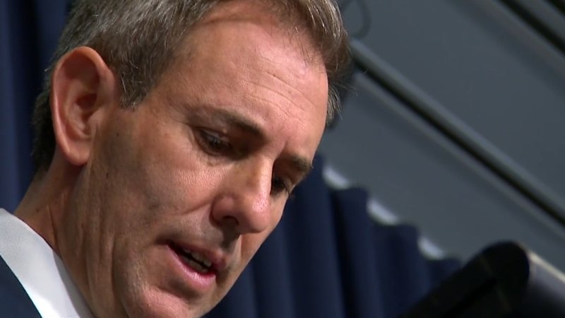 Treasurer warns Australian economy is 'hostage'