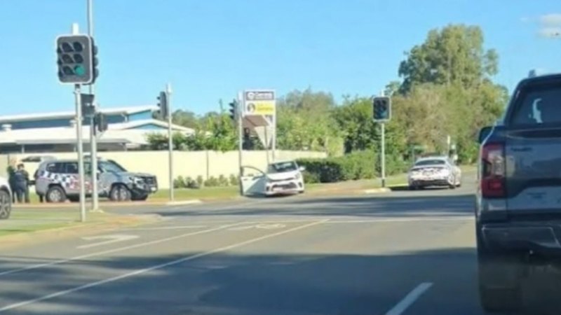 Manhunt under way after police car rammed in Brisbane