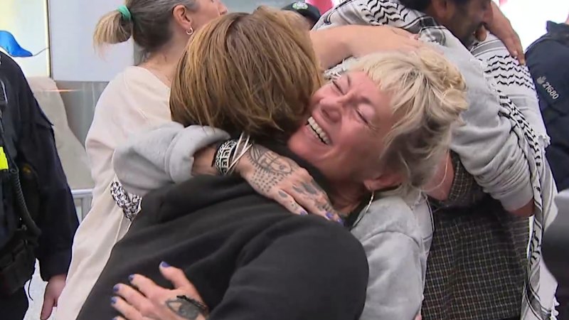 Activists detained by Israel arrive home