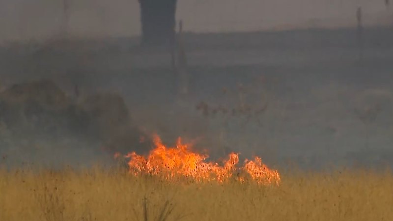 Fire burns out of control across suburbs in Melbourne’s north-west