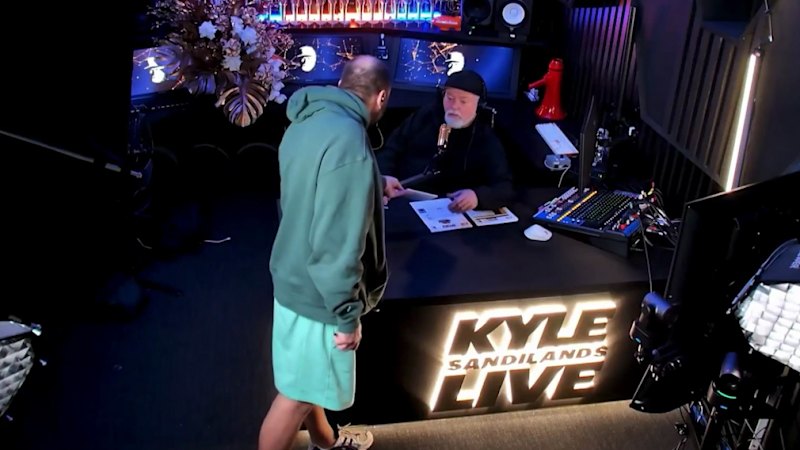 Kyle Sandilands served with subpoena papers live on-air