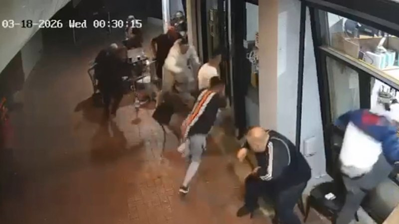 CCTV captures the moment man shot outside Melbourne cafe
