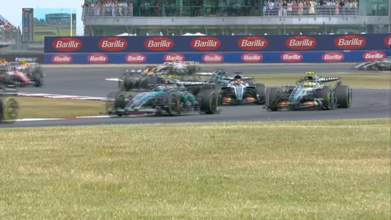 Russell mugs both McLarens in chaotic opening lap