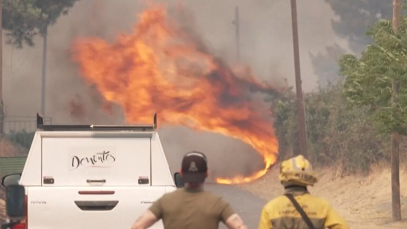 200,000 people forced to evacuate as wildfires rip through Spain and France