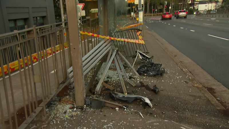 Woman charged after chaotic Sydney bus stop crash
