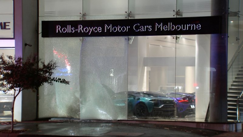 Arsonists target Melbourne luxury car dealership