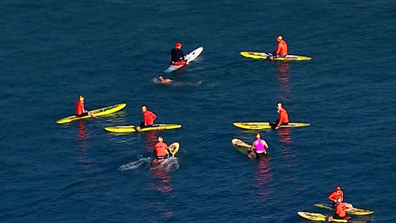 Community gathers for Coogee swim-out