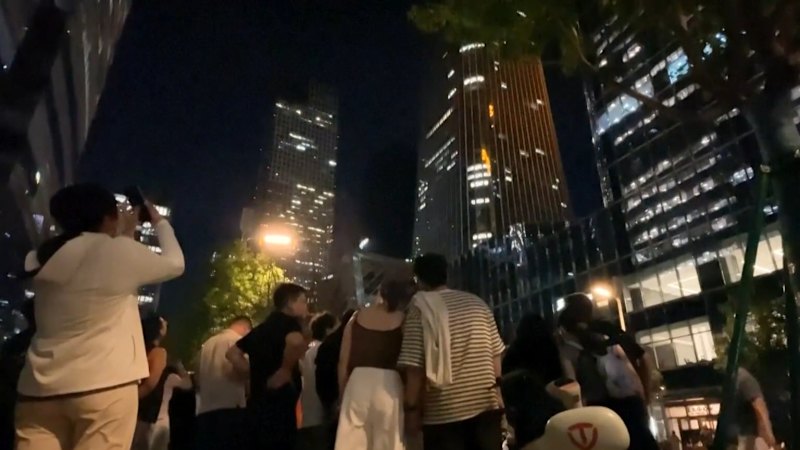 Light plane crashes into Beijing’s tallest building
