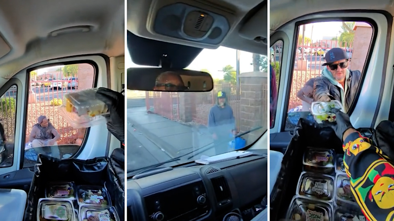 Ms Shirley handing out food to the homeless community