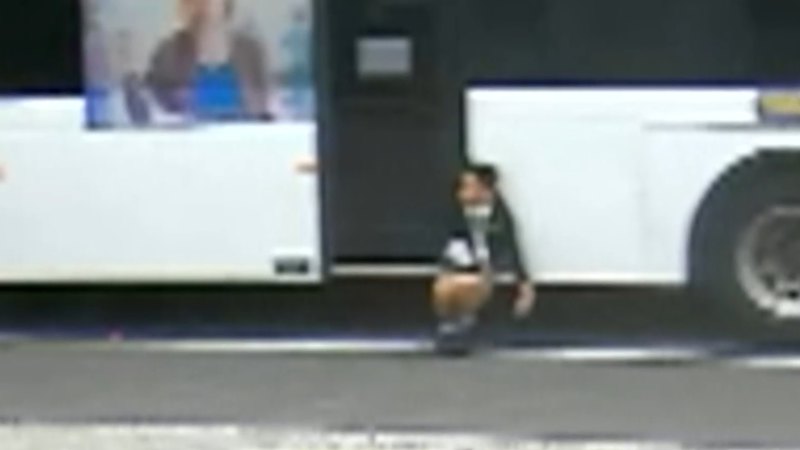 Driver fired after Melbourne schoolboy became trapped in bus doors