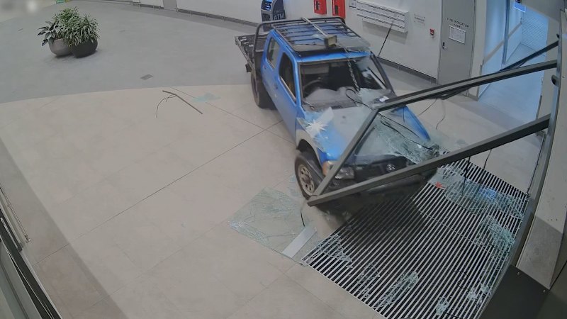 Thieves make off with ATM after ramming ute into shopping centre