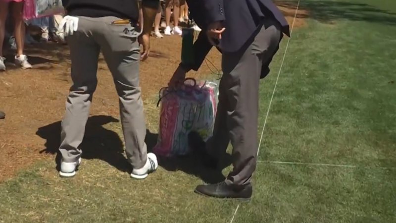 Schauffele's tee shot lands in merch bag