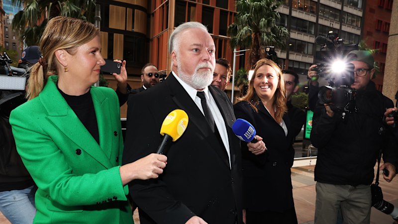 Kyle Sandilands speaks outside court