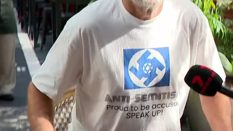 Man arrested over T-shirt worn outside royal commission hearing