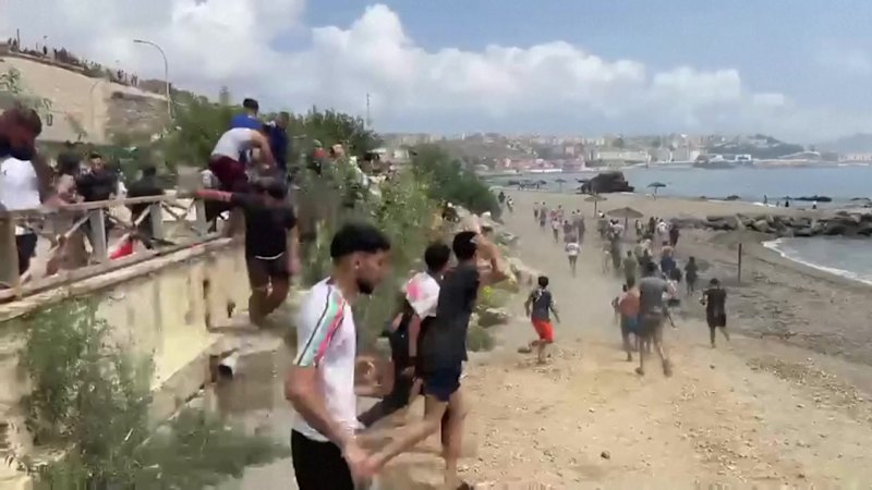 Thousands breach Morocco’s border into Spain