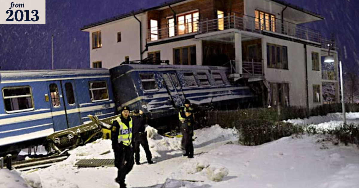 Stolen train crashes into building