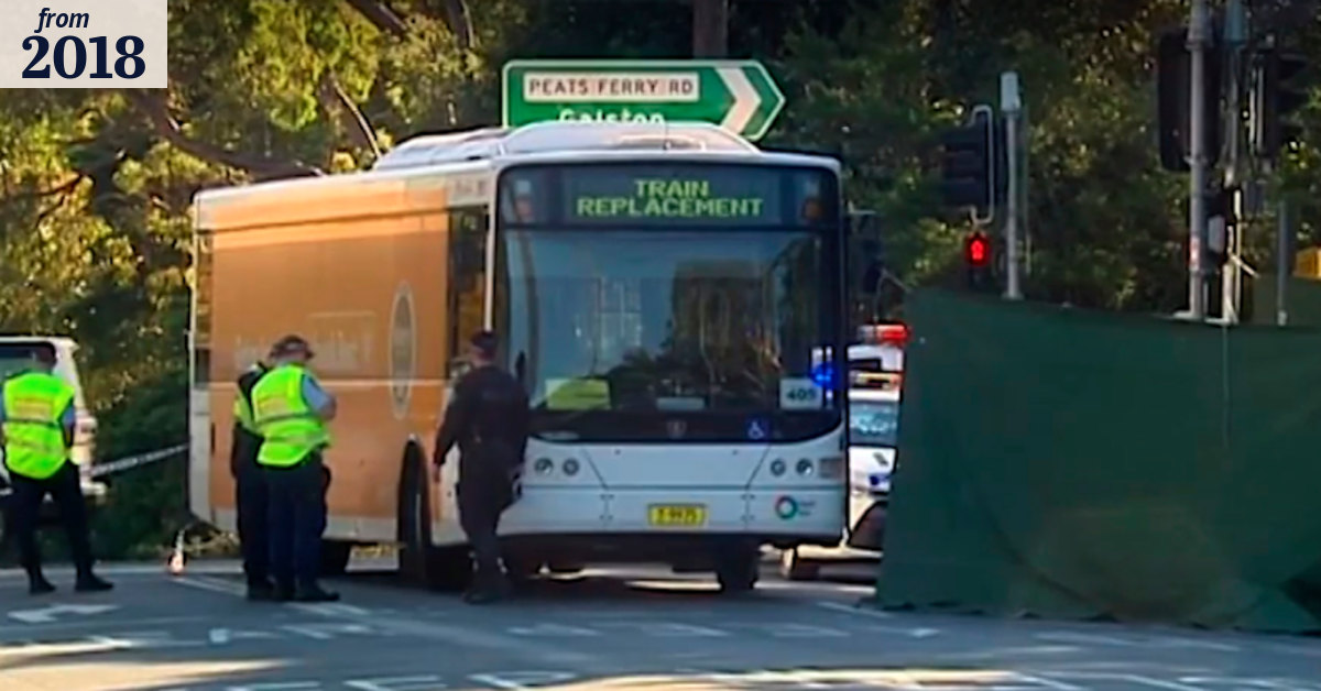 Man dies after being struck by bus while crossing road in Sydney