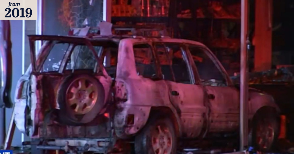 Alleged stolen car bursts into flames after crashing into shop