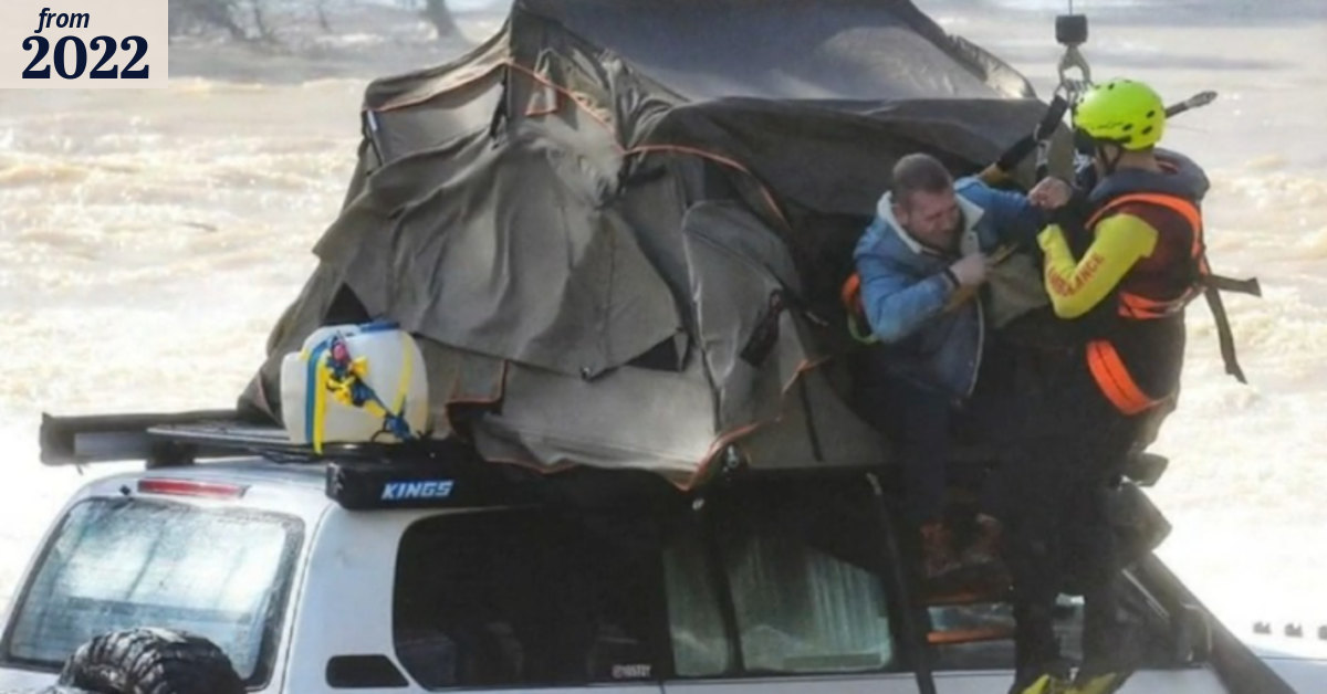 Campers rescued from rooftop tent amid flooding
