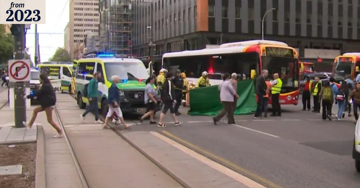Motorcyclist trapped under bus in Adelaide