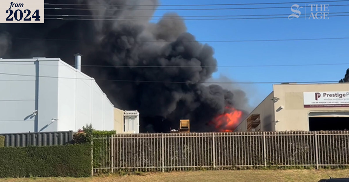 Firefighters are battling a factory fire in Sydney’s southwest
