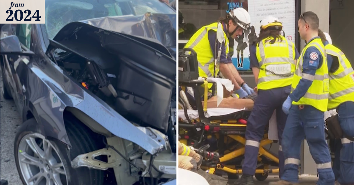 Couple trapped inside Tesla after crashing into power pole