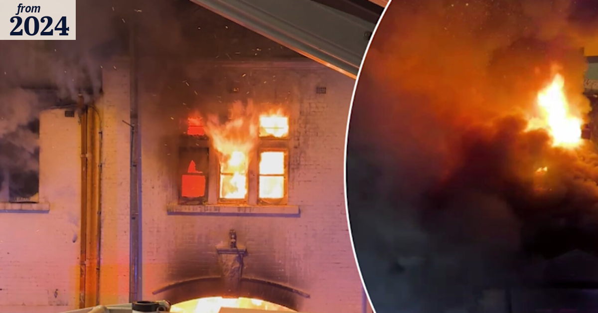Man arrested after more than 50 firefighters battle ferocious blaze in ...