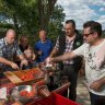 Loredana Grossi, Daniel Airo-Farulla, Lino Airo-Farulla, Rachele Saflekas, Frank Bovezza, Guy Grossi, Angelina Airo-Farulla and Adrienne Marson making tomato sauce.