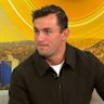 Australian Olympian Cooper Woods talks about being chosen to go down the slide for the FightMND campaign.