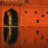 Crackling citadel ... (clockwise from far left) a woman looks out over Jodhpur and the fort; the Gulab Sagar basin at sunset