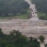 Vision shows floodwaters rising quickly on the Llano River, near Kingsland in Texas on Friday, July 4.
