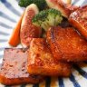 Pumpkin mochi cakes with sake and soy dressing.