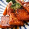 Pumpkin mochi cakes with sake and soy dressing.