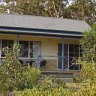 House on the hill ... Waverley House Cottages set in landscaped bush gardens.