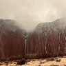 Rain and thunderstorms have drenched parts of central Australia in the last couple of days, causing waterfalls to cascade down the sides of Uluru following the monolith’s best September rain on record. Vision - rachelcrowley_ / instagram