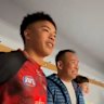 Jayden Nguyen will make his AFL debut for Essendon on Saturday against Sydney; here, his family presents him with his jumper for his VFL debut at the club.