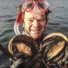 Shell be right: Rob Pennicott dives for abalone.