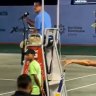 Bernard Tomic gets in animated disussions with officials while watching the RD Open final between Andres Andrade and Damir Dzumhur in Santo Domingo.