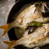 Pan-roasted snapper with garlic and bay leaves.