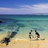 Sea change ... children play at Mimosa Rocks.