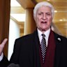 Bob Katter invoked his Middle Eastern heritage when questioned by a cameraman, months after threatening to punch journalist for raising it.