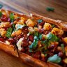 Pide with basturma, prawn meat and feta.