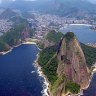 Aerial view showing the beach of Copacabana (L) and the Sugar Loaf hill in Rio de Janeiro, Brazil