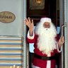 Cross our heart ... (from left) dining in the restaurant car; winding through the outback; Santa's a hit with children in Watson.