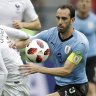 Godin lauds Uruguay "lions", exonerates goalkeeper